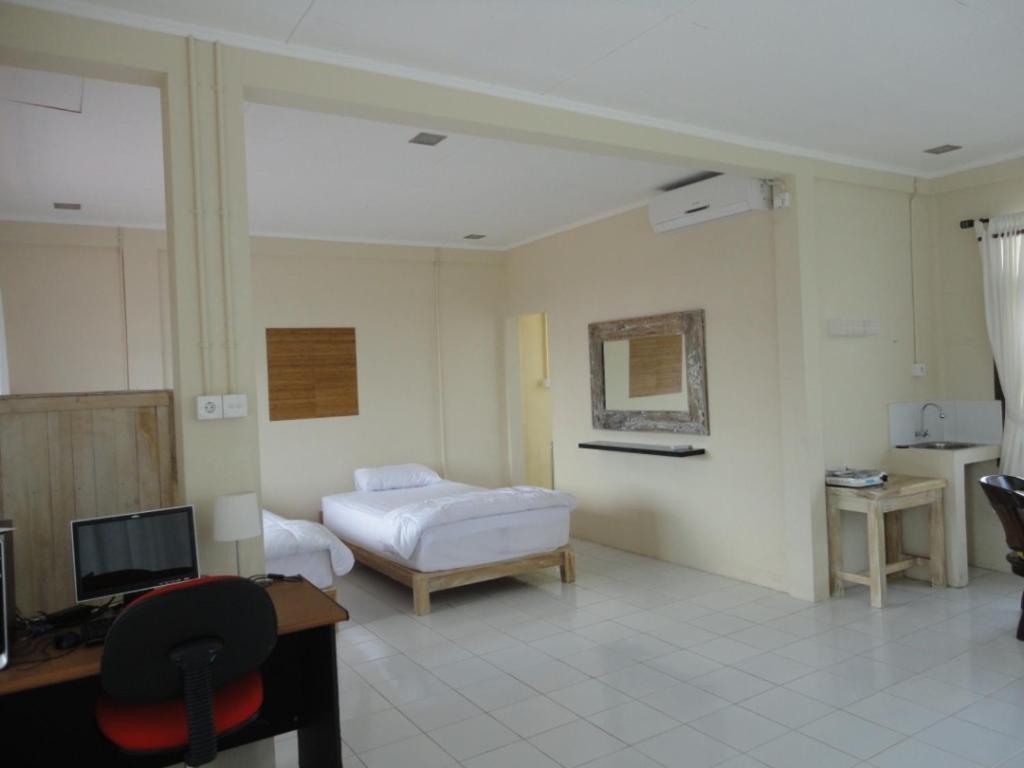 דנפסאר Urbanview Hotel Wayan Mansion חדר תמונה